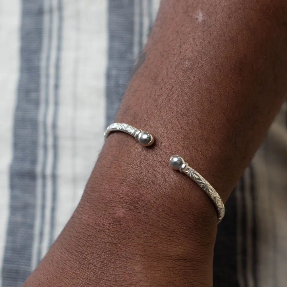 Heavy Bangle with Solid Balls and Calypso Pattern