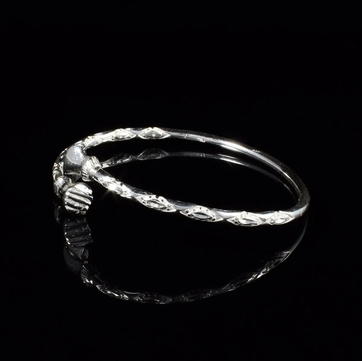 Light  Bangle with Fists Diamante Pattern