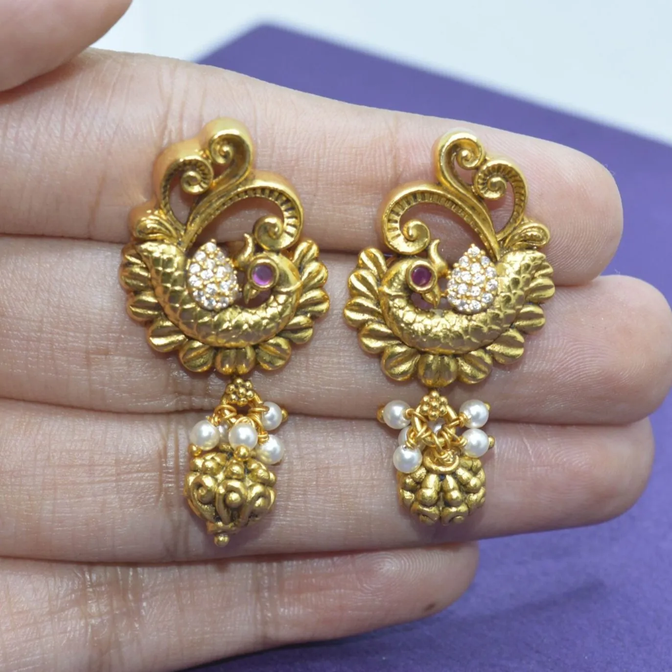 Regal Peacock charm earrings